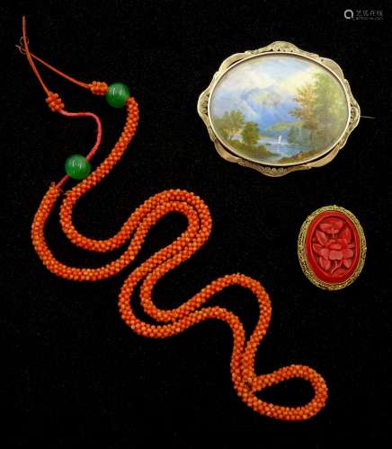 19th/early 20th century brooch depicting a Lake District scene on ivory, coral and green bead neckl