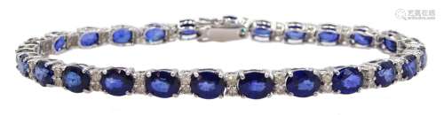 18ct white gold oval cut sapphire and round brilliant cut diamond bracelet, stamped 750, total sapp