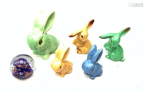 Five Sylvac Rabbits, to include a large example marked 1026, etc., together with a Caithness glass