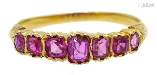 Early 20th century 18ct gold graduating seven stone, cushion cut ruby ring