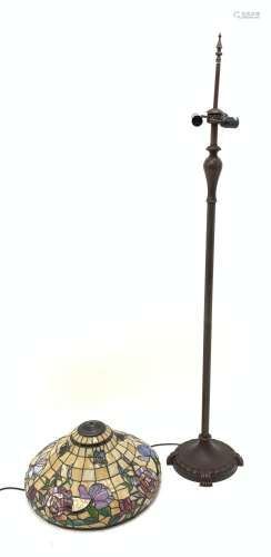 A Tiffany style standard lamp, the bronze effect art nouveau inspired based (lacking one column sect