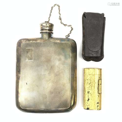 An Asprey silver plated hip flask, of rounded rectangular form with engine turned panel decoration t