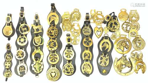 A collection of assorted horse brasses.