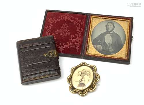 A 19th century ambrotype miniature of a gentleman, within a foliate engraved mount and plush lined l