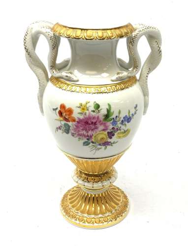 A Meissen twin handled vase, of baluster form with waisted neck, serpent modelled handles, and rais