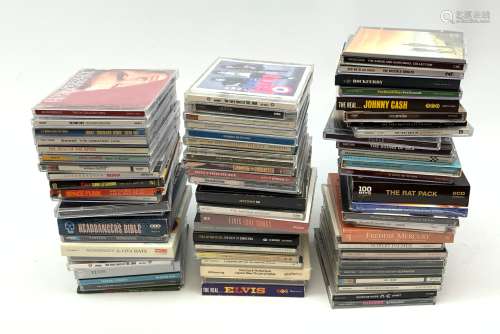 A collection of approximately seventy five CD's, to include a examples by Queen, The Jam, Ramones, U