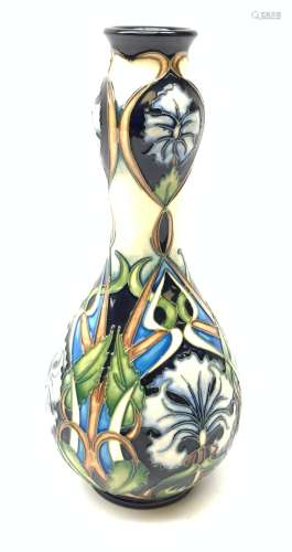 A Moorcroft vase of bulbous form with tall waisted neck, decorated in the Centaurea pattern, designe