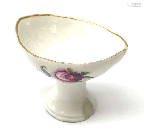 A H�chst eyebath c.1775, the oval bowl painted in polychrome enamels with floral sprays, blue wheel