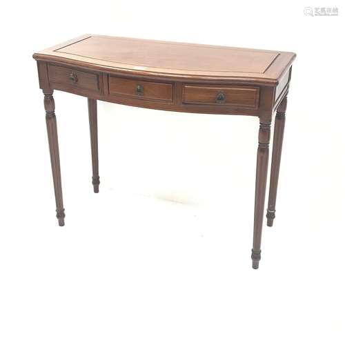 Chinese rosewood serpentine front side table, three drawers, turned tapering fluted supports, W92cm