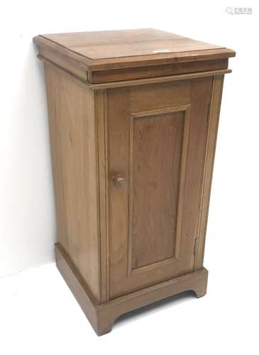 Victorian fruitwood bedside cabinet, hinged top enclosing porcelain wash bowl, above single cupboar