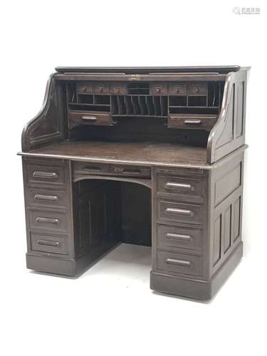 Late 19th/early 20th century oak 'S' shaped tambour roll top desk, fitted interior, eight drawers,