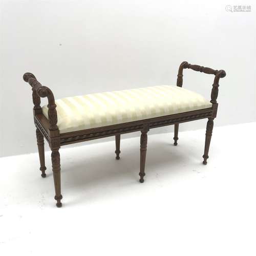 Regency style mahogany window bench seat, carved scrolled arms, six turned and fluted supports, W11