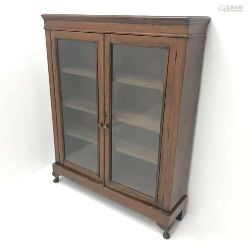 Victorian walnut bookcase, two glazed doors enclosing three adjustable shelves, cabriole feet, W107