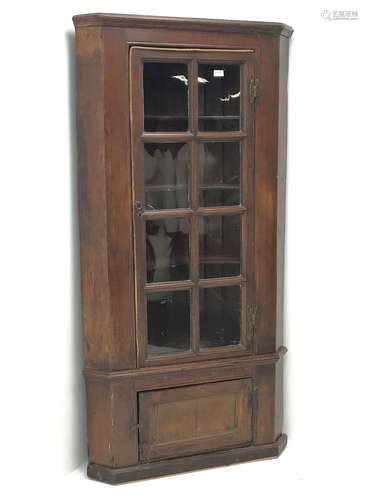 19th century stained pine barrel back corner cupboard, moulded cornice, astragal glazed door enclosi