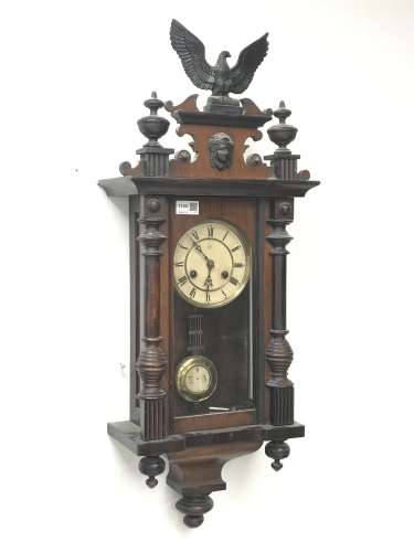 Late 19th century walnut cased Vienna style wall clock, with eagle and final pediment, twin train '