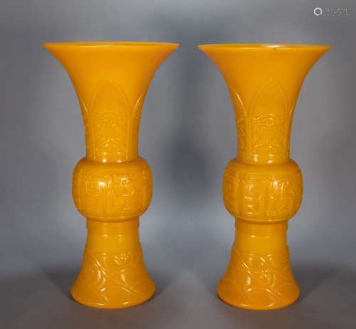 A PAIR OF ANCIENT CHINESE YELLOW GLASS FLOWER GOBLETS