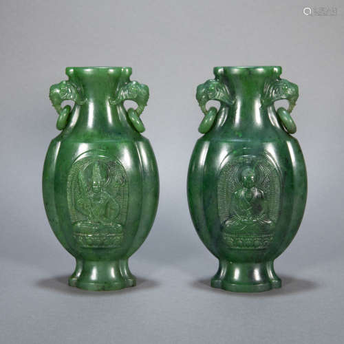 A PAIR OF ANCIENT CHINESE JASPER BOTTLES WITH ELEPHANT SHAPED HANDLE