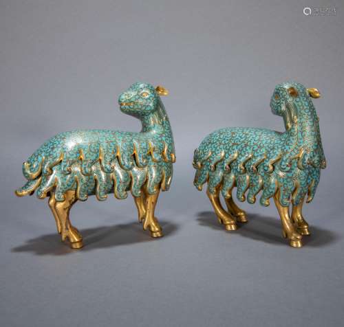 A PAIR OF ANCIENT CHINESE GILT BRONZE AND ENAMEL COLORED SHEEP