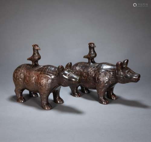 A PAIR OF ANCIENT CHINESE HETIAN JADE BEASTS