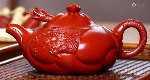 A DRAGON PATTERN ZISHA POT MADE BY ZHUANGQIFANG