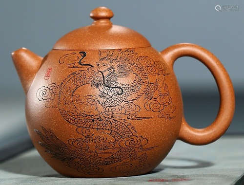 A DRAGON PATTERN ZISHA POT MADE BY LIUYING