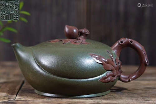 A ZISHA POT MADE BY ZHANGJIALONG