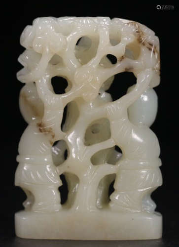 A HETIAN JADE CARVED CHILD SHAPE PENDANT