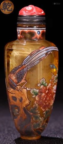 A GLASS CARVED FLOWER PATTERN SNUFF BOTTLE