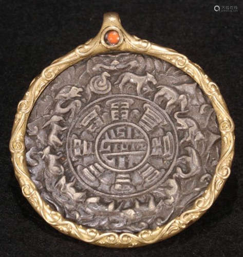 A TIBETAN GILT BRONZE CASTED BAGUA PATTERN TABLET