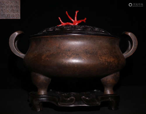 A COPPER CASTED TRIPOD CENSER