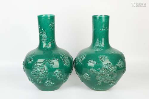 A Pair Of Green Glazed Porcelain Globular Vases