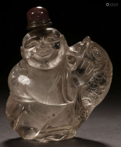 A CRYSTAL CARVED SNUFF BOTTLE