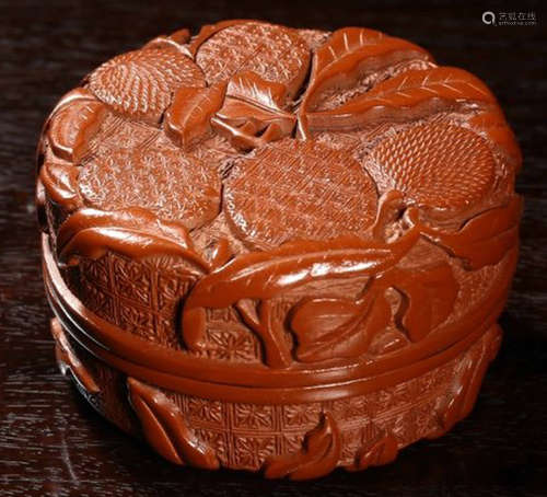 A LACQUER CARVED BOX