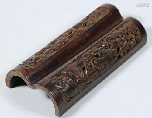 A BAMBOO CARVED ARM REST