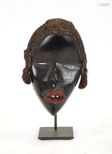 Dan Takanglé Mask \nThe stretched eyes, the delicat…