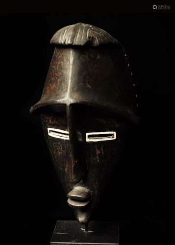 Lwalwa Mask \nWood with a glossy black patina \nDemo…