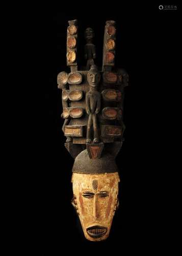 Impressive and spectacular Igbo mask surmounted by…