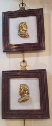Pair of porphyry frames framing 2 bronze busts rep…