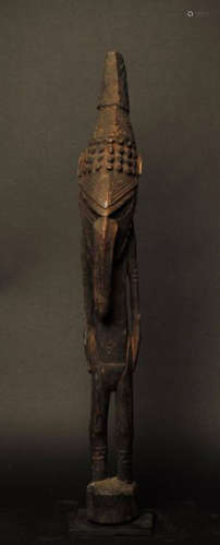 Wooden standing figure with dark patina \nPapua New…