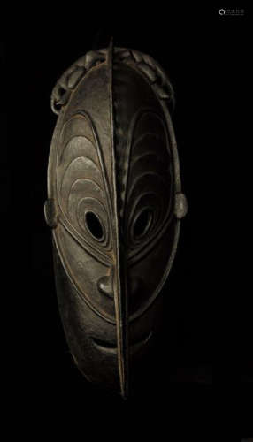 Important Sepik mask \nSculpted wood with a crusty …