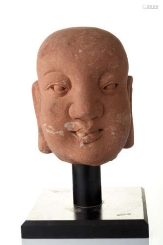 Head of Lohan, disciple of Buddha, in grey sandsto…