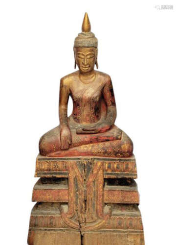 Sitting Buddha in bhumisparsha mûdra taking the ea…