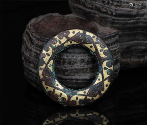 A Bronze Parcel Gilt Ring