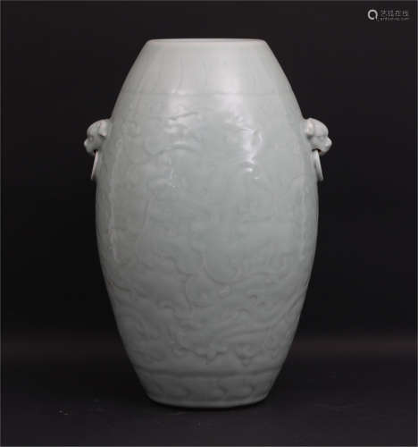 Celadon glaze carved olive vase Qing Dynasty