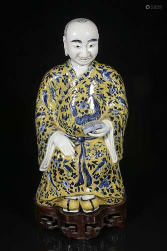 Qing Yellow ground blue and white figure sitting statue