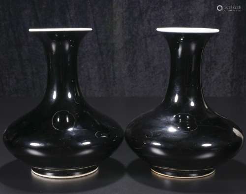 Mid-twentieth century A pair of black glaze bottles