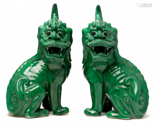 A PAIR OF GREEN-GLAZED MYTHICAL BEASTS
