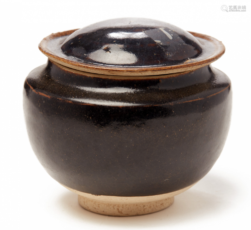 A BLACK-GLAZED JAR AND A COVER