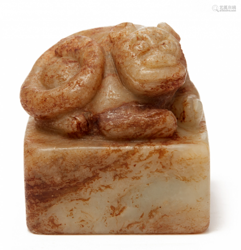 A CARVED JADE SEAL WITH A LION