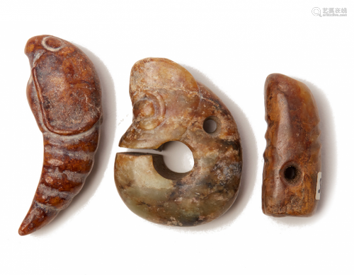 THREE SMALL CARVED JADE PENDANTS